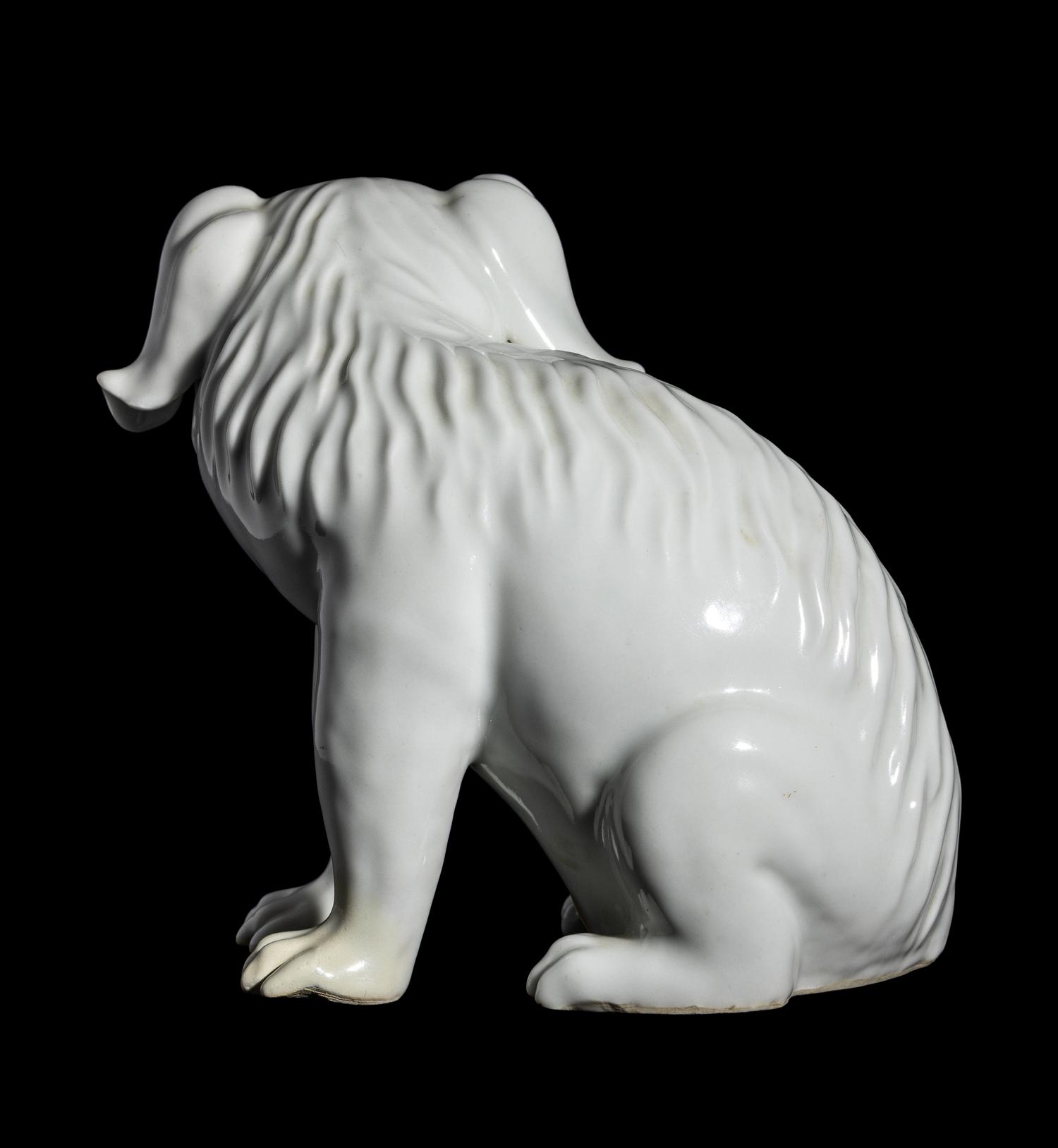 A Japanese Hirado White Glazed Porcelain Figure of a Puppy