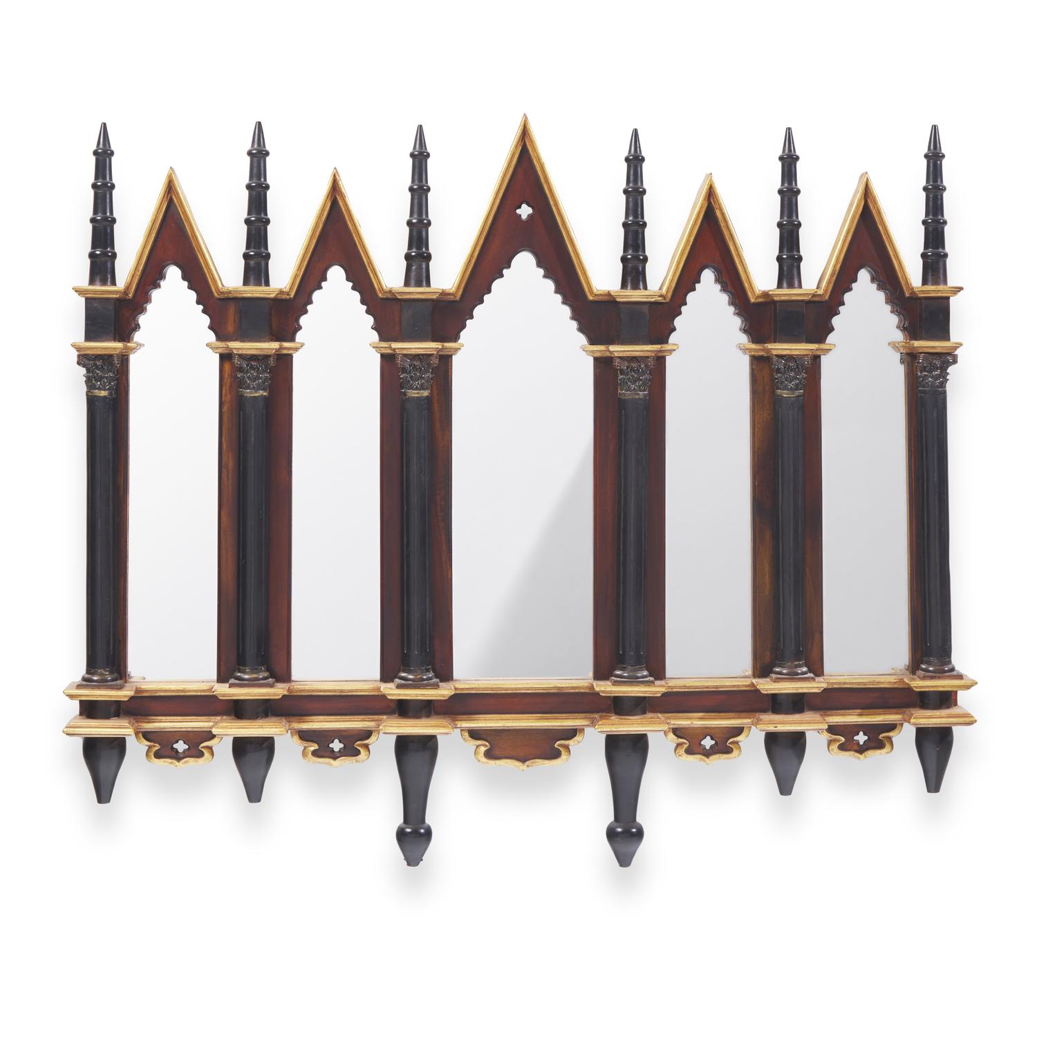 A Neogothic Style Ebonized and Parcel-Gilt Mirror