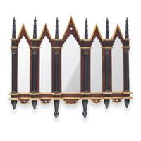 A Neogothic Style Ebonized and Parcel-Gilt Mirror