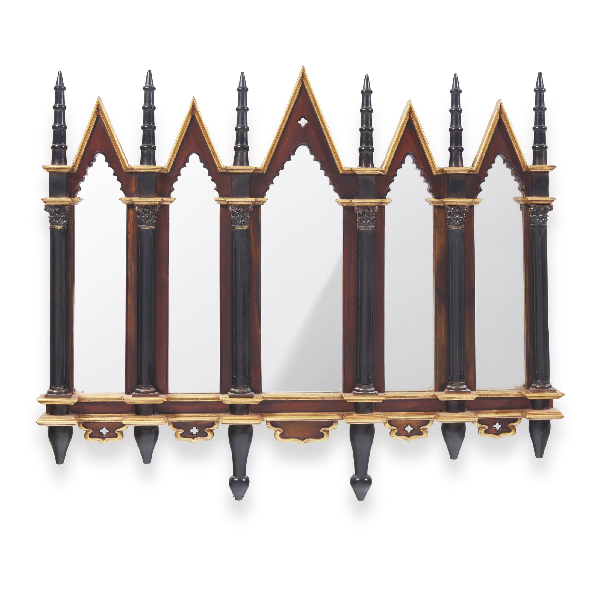 A Neogothic Style Ebonized and Parcel-Gilt Mirror