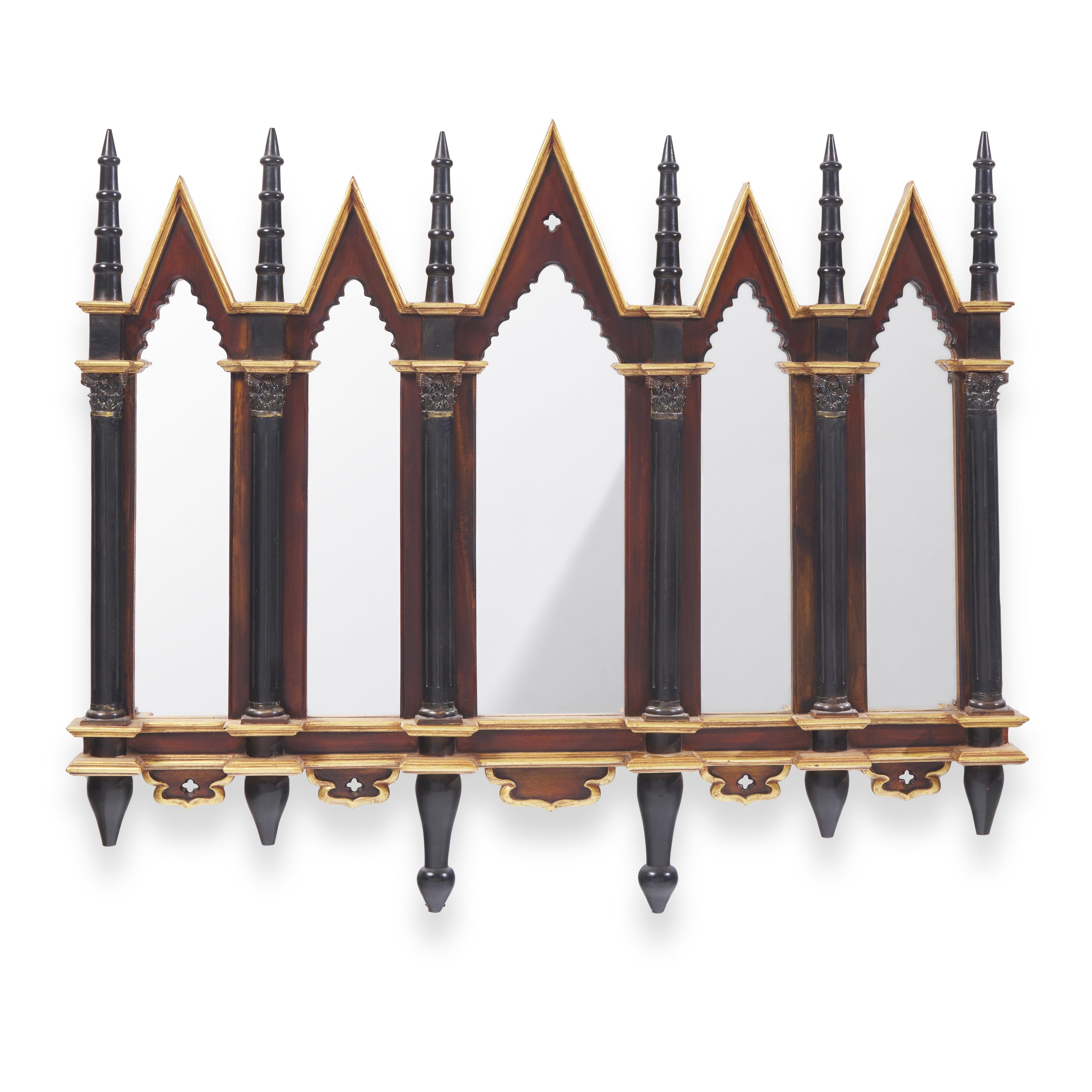 A Neogothic Style Ebonized and Parcel-Gilt Mirror