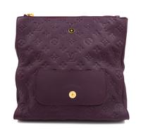 A Louis Vuitton Plum Monogram Empreinte Leather Petillante Clutch, 7" H x 10.75" W x 2.5" D.