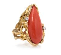 A 14 Karat Yellow Gold, Coral and Diamond Ring, 11.80 dwts.