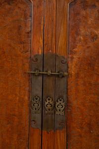 A Chinese Huanghuali and Burl Veneer Cabinet