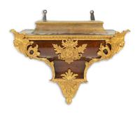 A Louis XV Gilt Bronze Mounted Kingwood Bracket Clock and Matching Wall Bracket