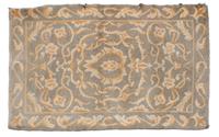 A Wool Rug — 20TH CENTURY