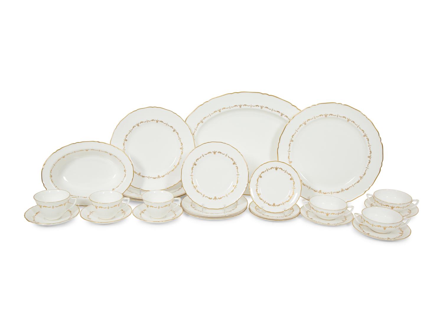 A Royal Worcester Gold Chantilly Porcelain Dinner Service