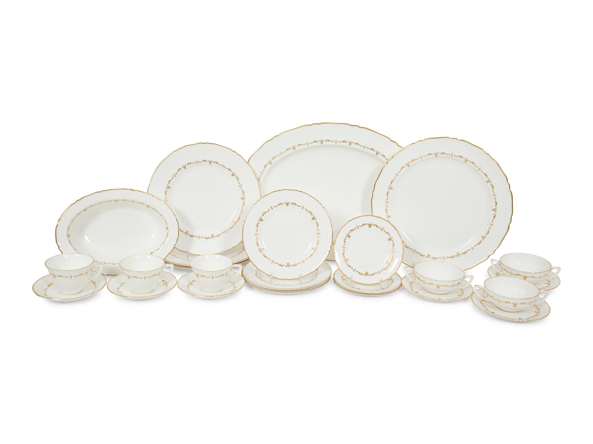 A Royal Worcester Gold Chantilly Porcelain Dinner Service