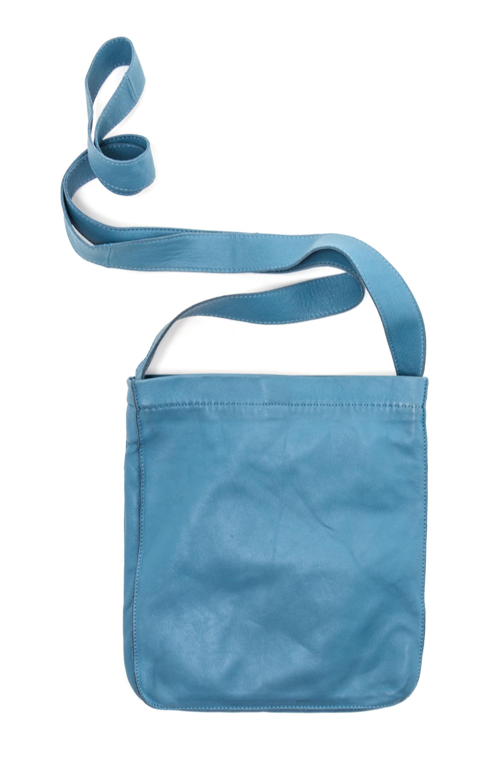 An Hermes Bleu Lin Agneau Clou de Selle Pouch, 6" x 9" x 1".