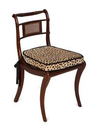 A Set of Four Regency Style Mahogany Cane Seat Dining Chairs