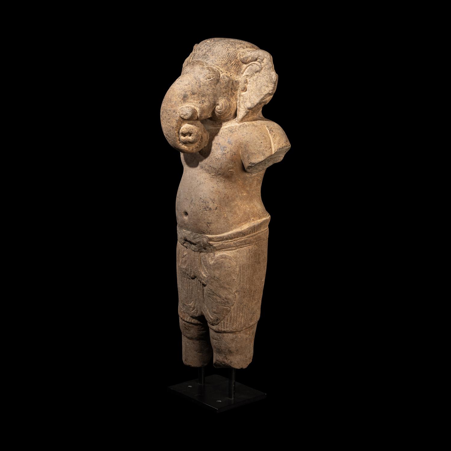A Khmer Grey Sandstone Figure of Ganesha, Angkor Period, 10th-11th Century 十-十一世紀 吳哥窟灰沙岩象鼻天立像