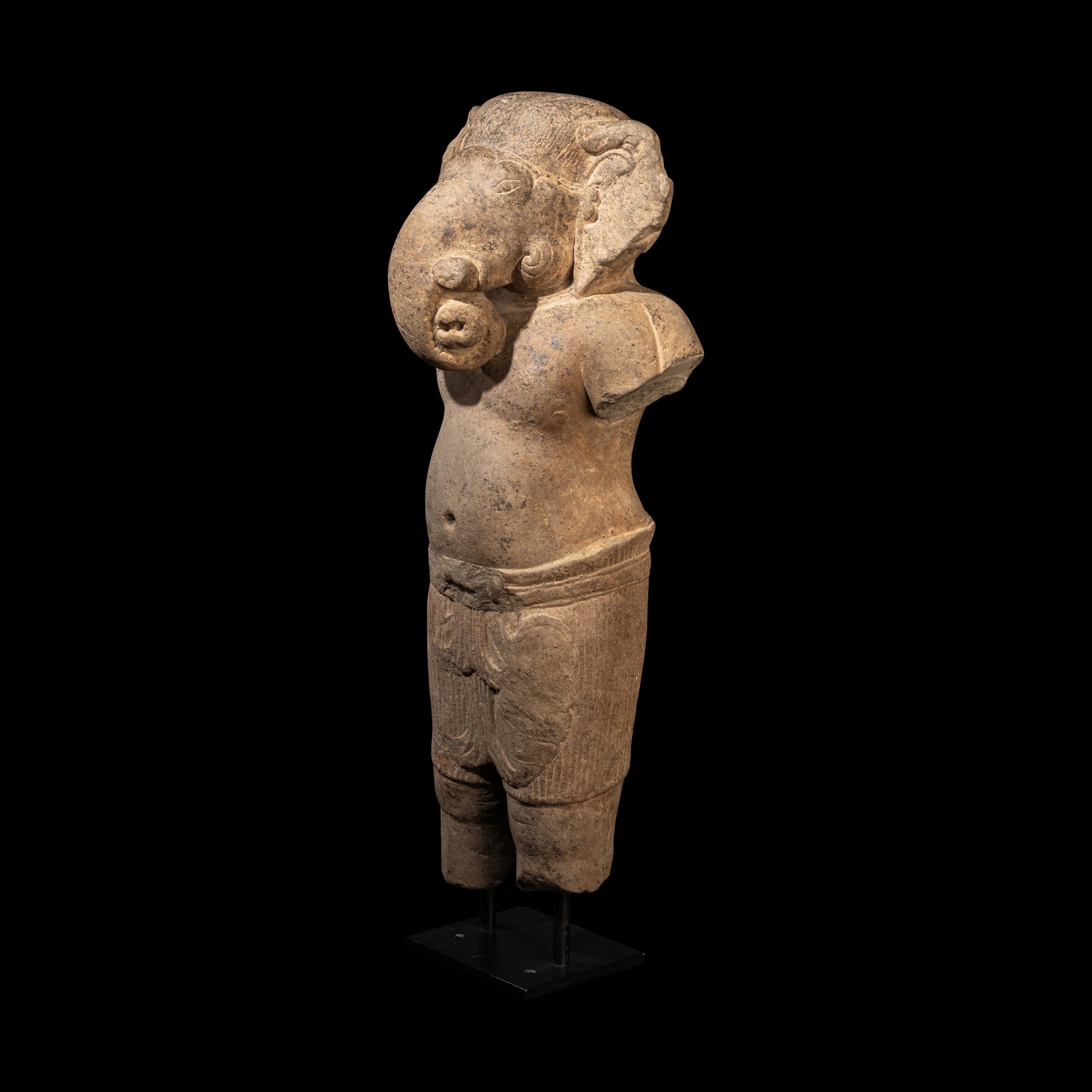 A Khmer Grey Sandstone Figure of Ganesha, Angkor Period, 10th-11th Century 十-十一世紀 吳哥窟灰沙岩象鼻天立像
