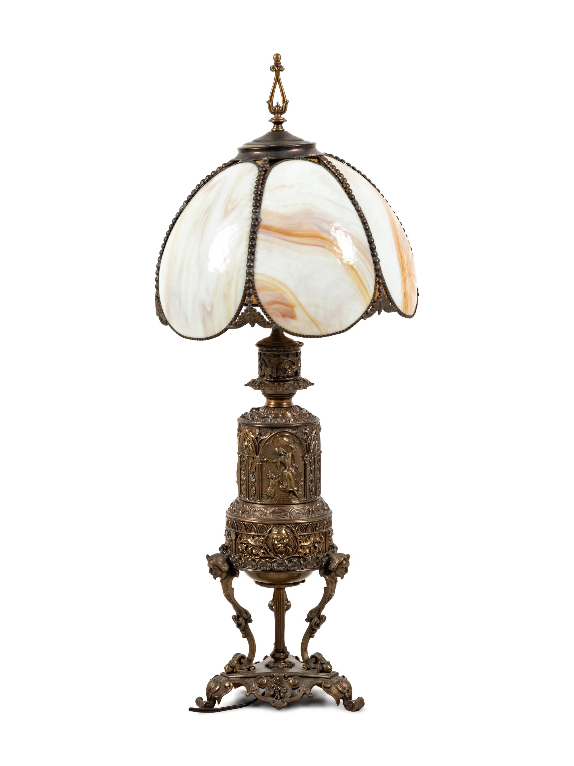 An American Renaissance Revival Slag Glass and Cast Metal Lamp