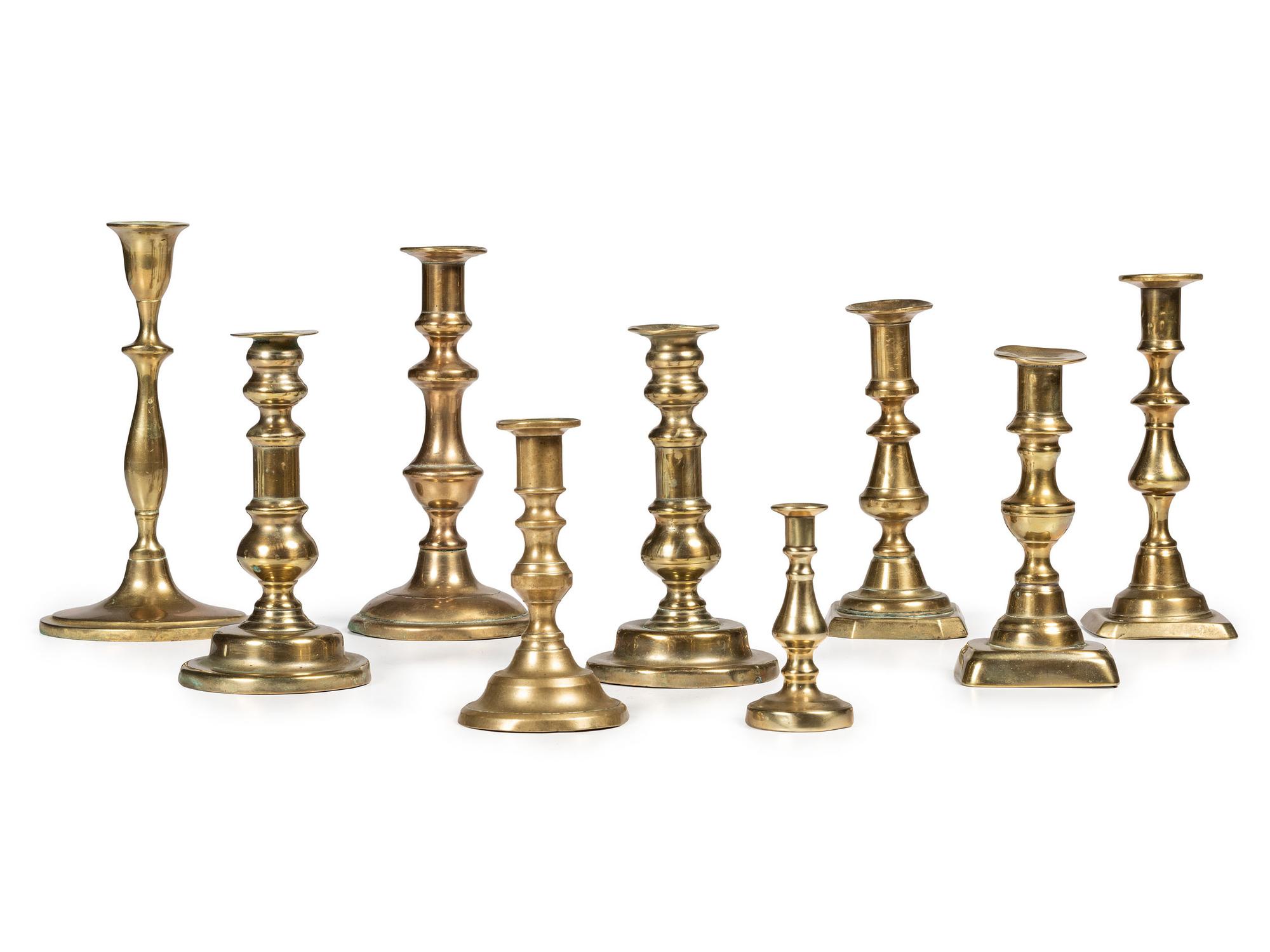 Nine English Brass Candlesticks