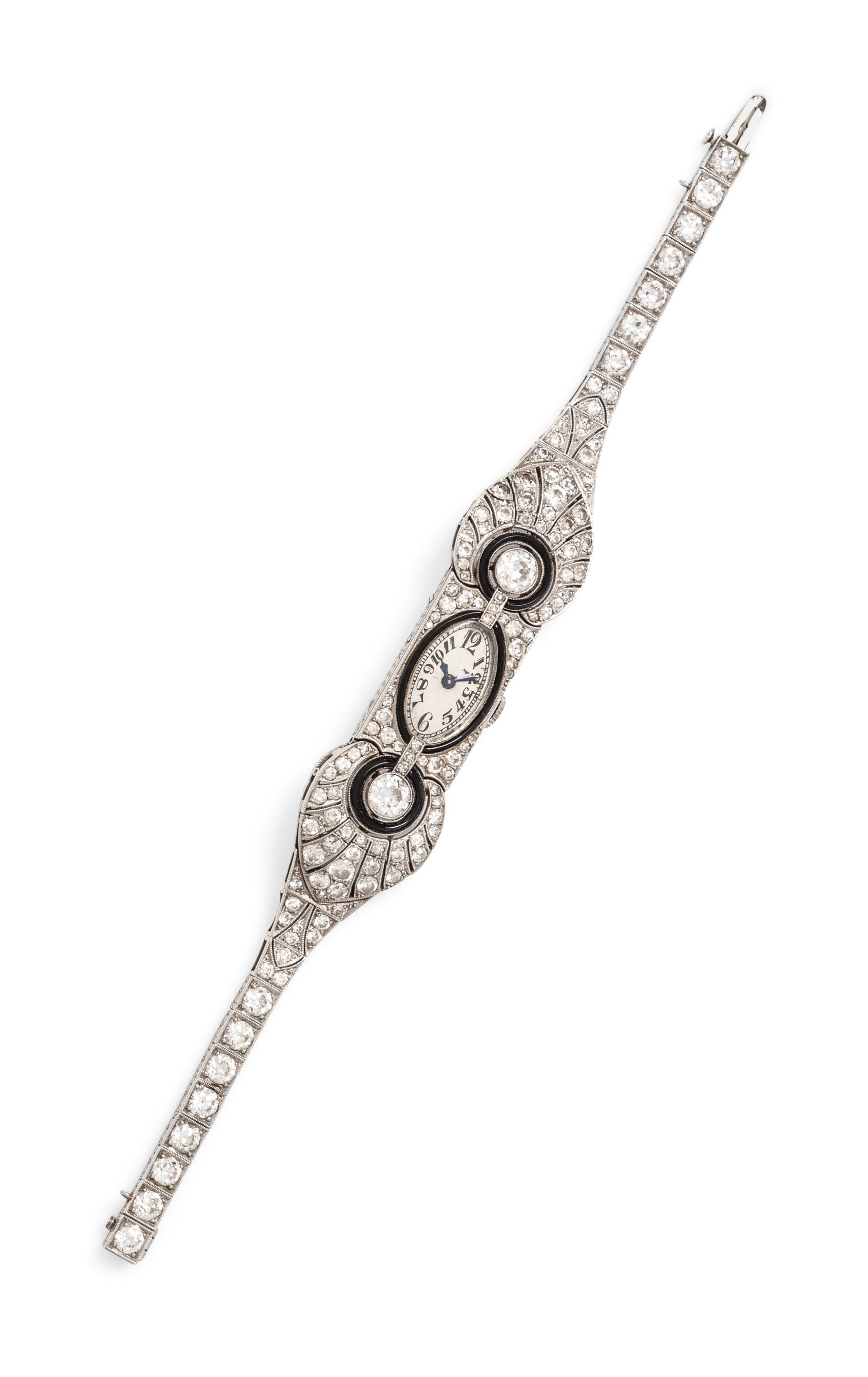 An Art Deco Platinum, Diamond and Onyx Wristwatch, French,