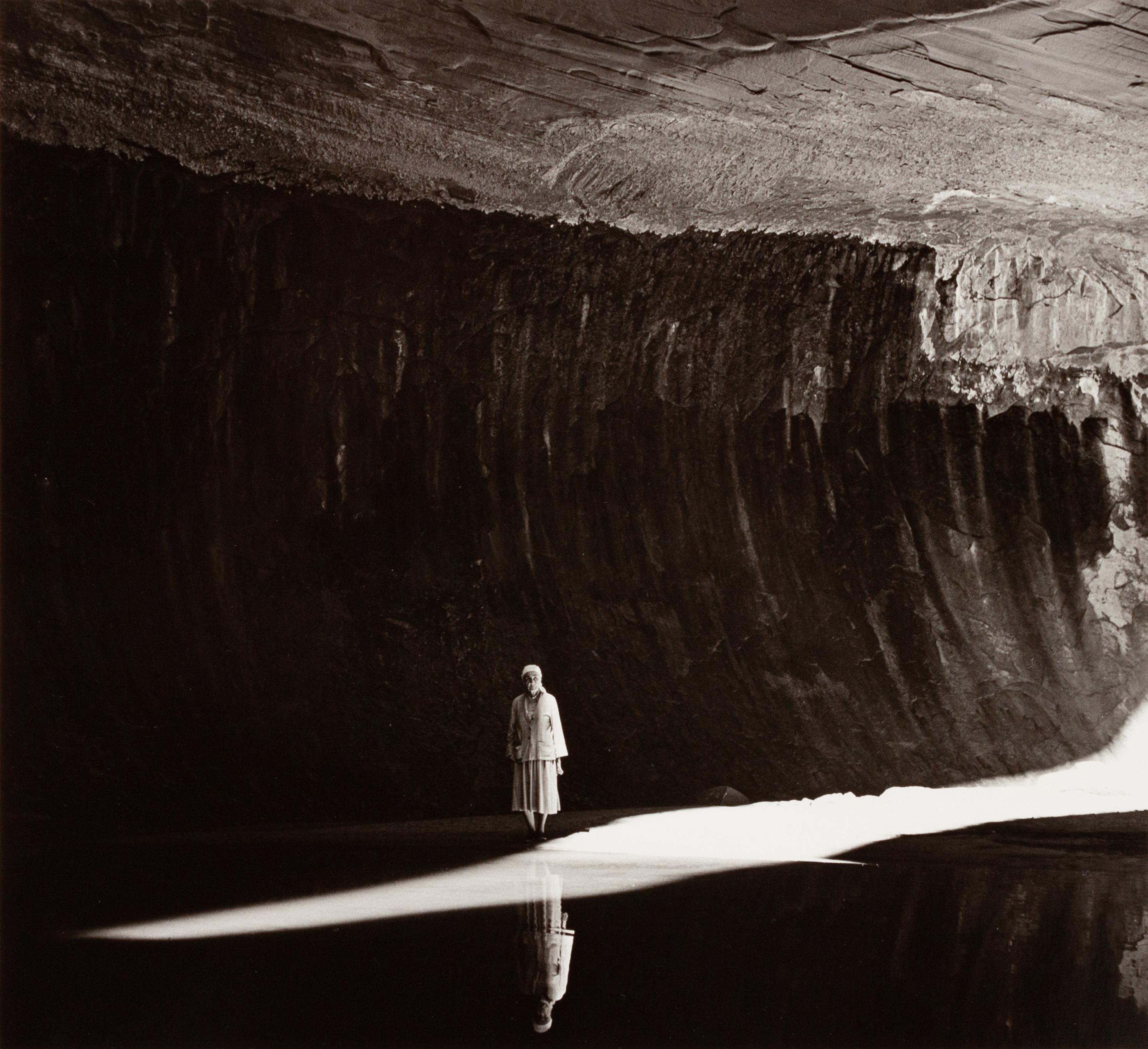 A group of five photographs ( O'Keeffe in the Canyon Under the Lake , 1964 (printed 1985); O'Keeffe Standing in Cavern , 1964 (printed 1984) Georgia O'Keeffe in Twilight Canyon , 1964 (printed 1985); Georgia O'Keeffe Photographing the Chama River , 1961 (printed 1984); O'Keeffe Sketching in Glen Canyon , 1961 (printed 1985))