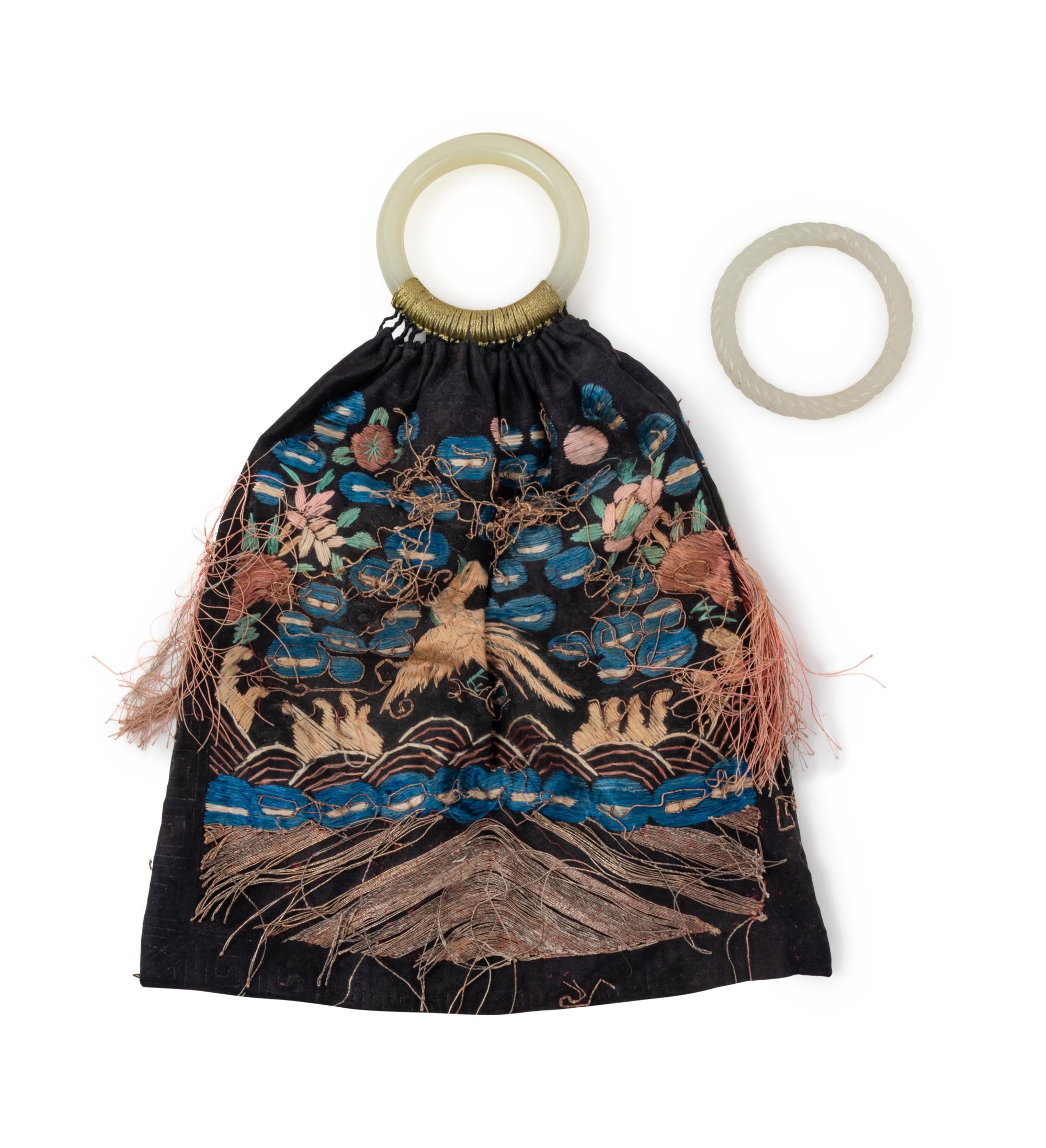 A Chinese Silk Embroidered Bag with Celadon Jade Ring Handles