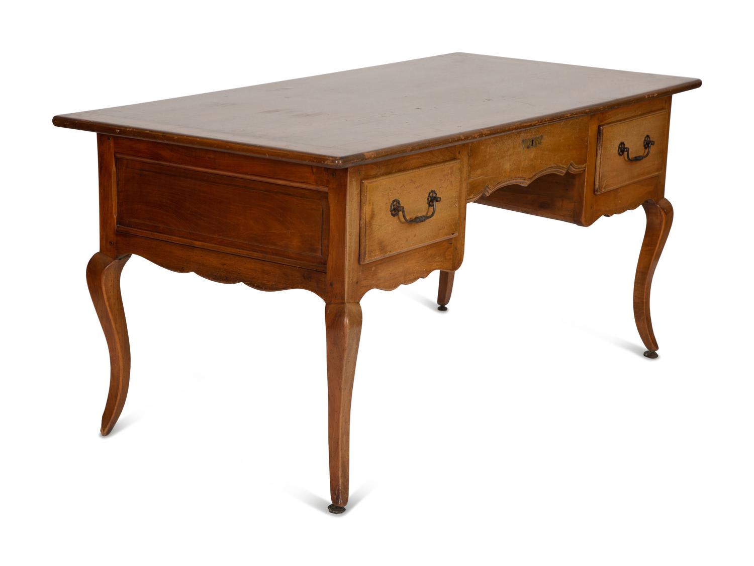 A Louis XV Provincial Style Fruitwood Writing Table