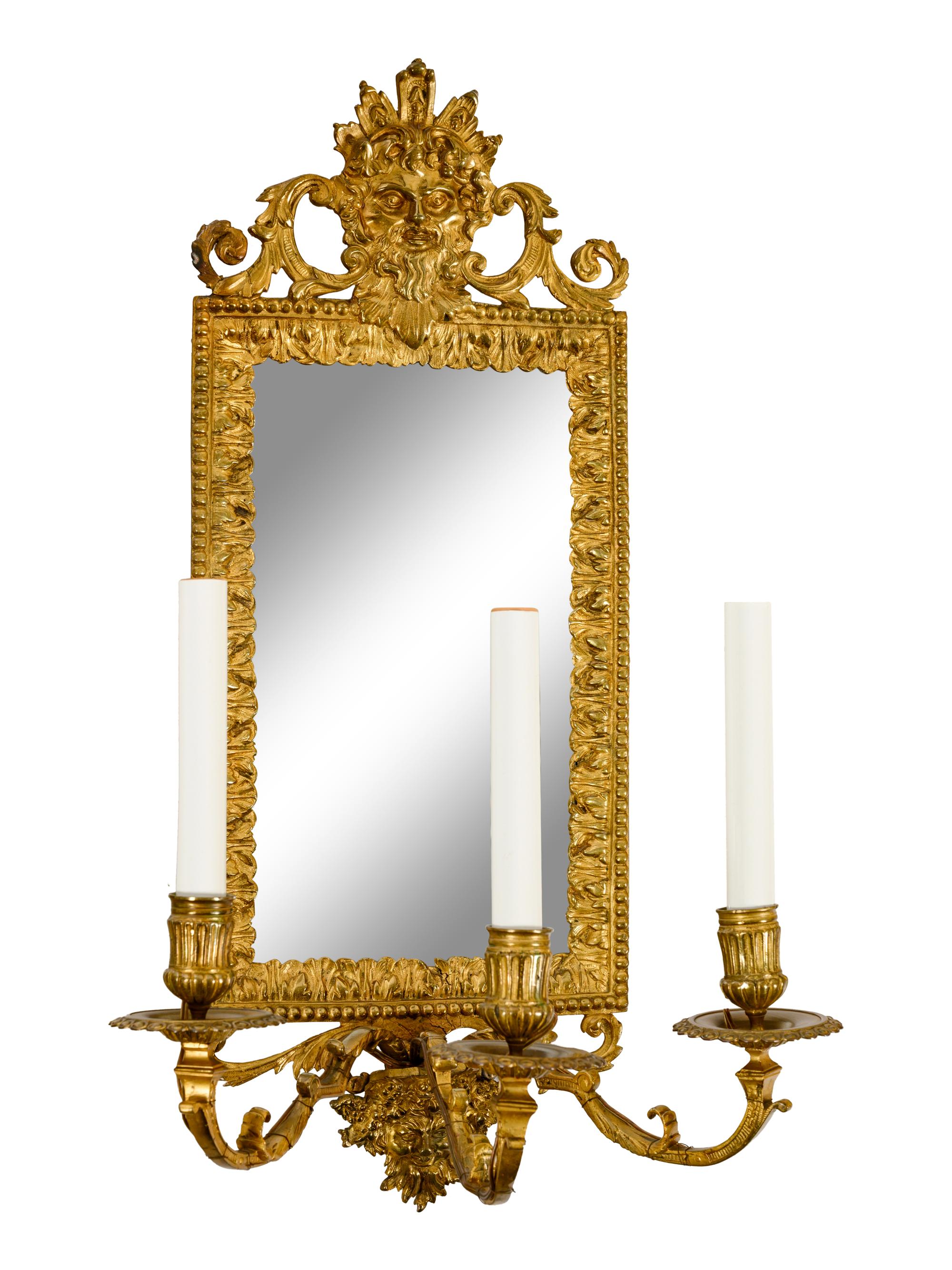 A Pair of Continental Mirror-Inset Gilt Brass Three-Light Girandoles