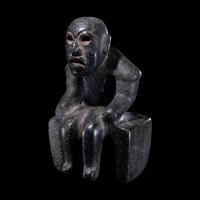 An Olmec Serpentine Seated Figure
