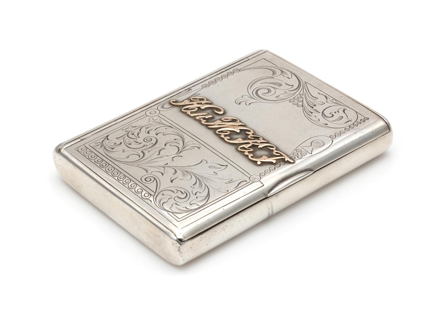 A Russian Silver Cigarette Case, Mark of Ivan Khlebnikov with Imperial Warrant, Moscow, Late 19th/Early 20th Century, the lid with engr