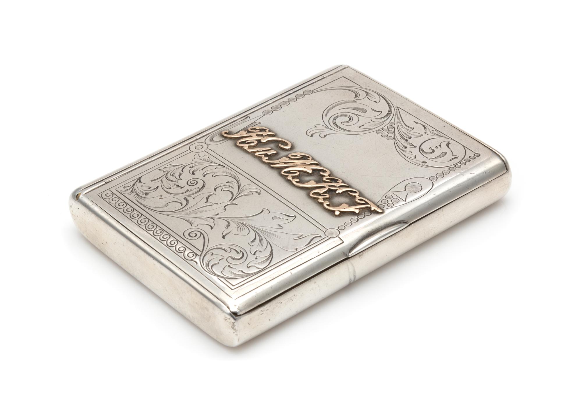 A Russian Silver Cigarette Case, Mark of Ivan Khlebnikov with Imperial Warrant, Moscow, Late 19th/Early 20th Century, the lid with engr