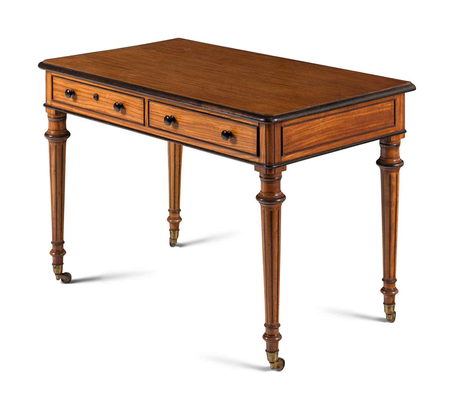 An English Satinwood and Parcel-Ebonized Dressing Table