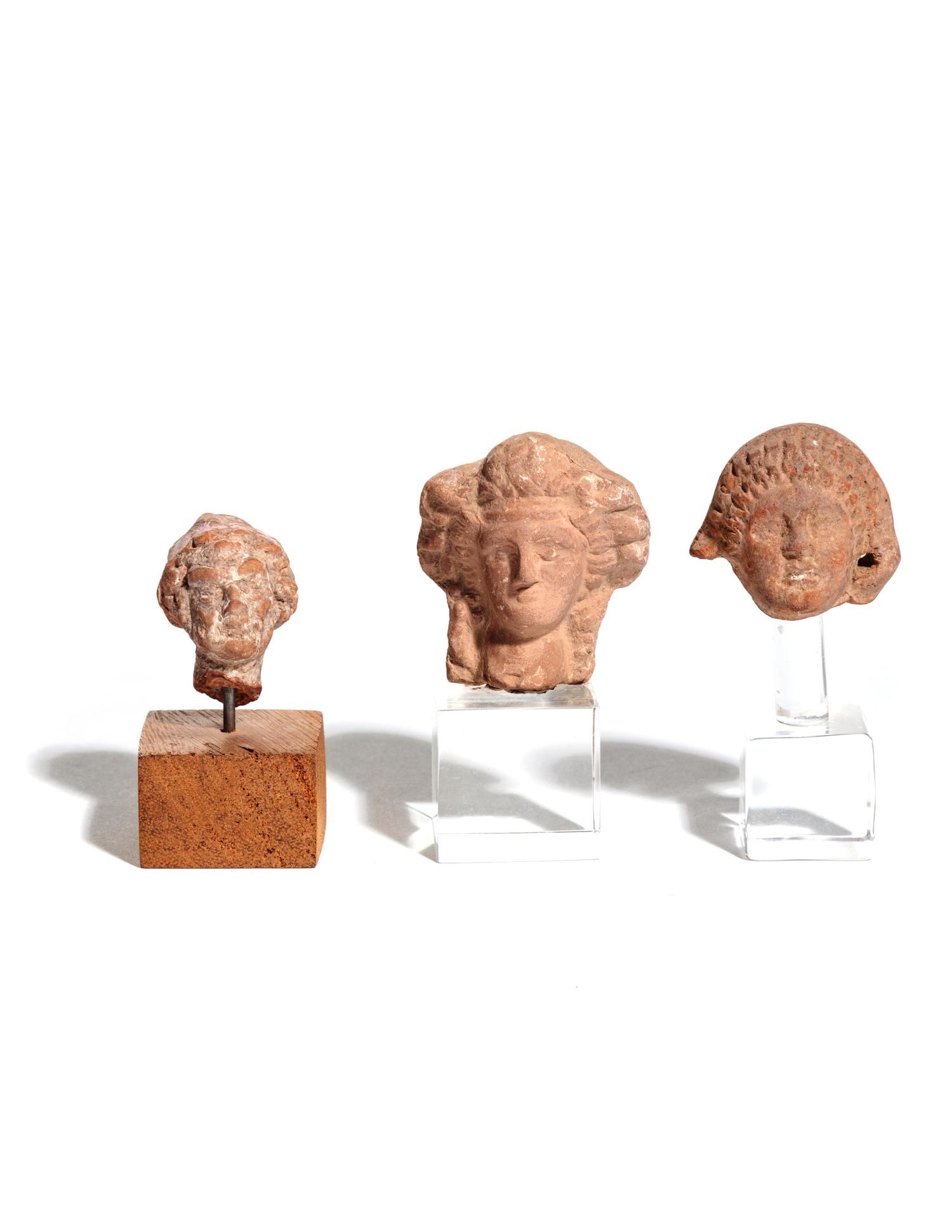 Three Graeco-Roman Terra Cotta Heads