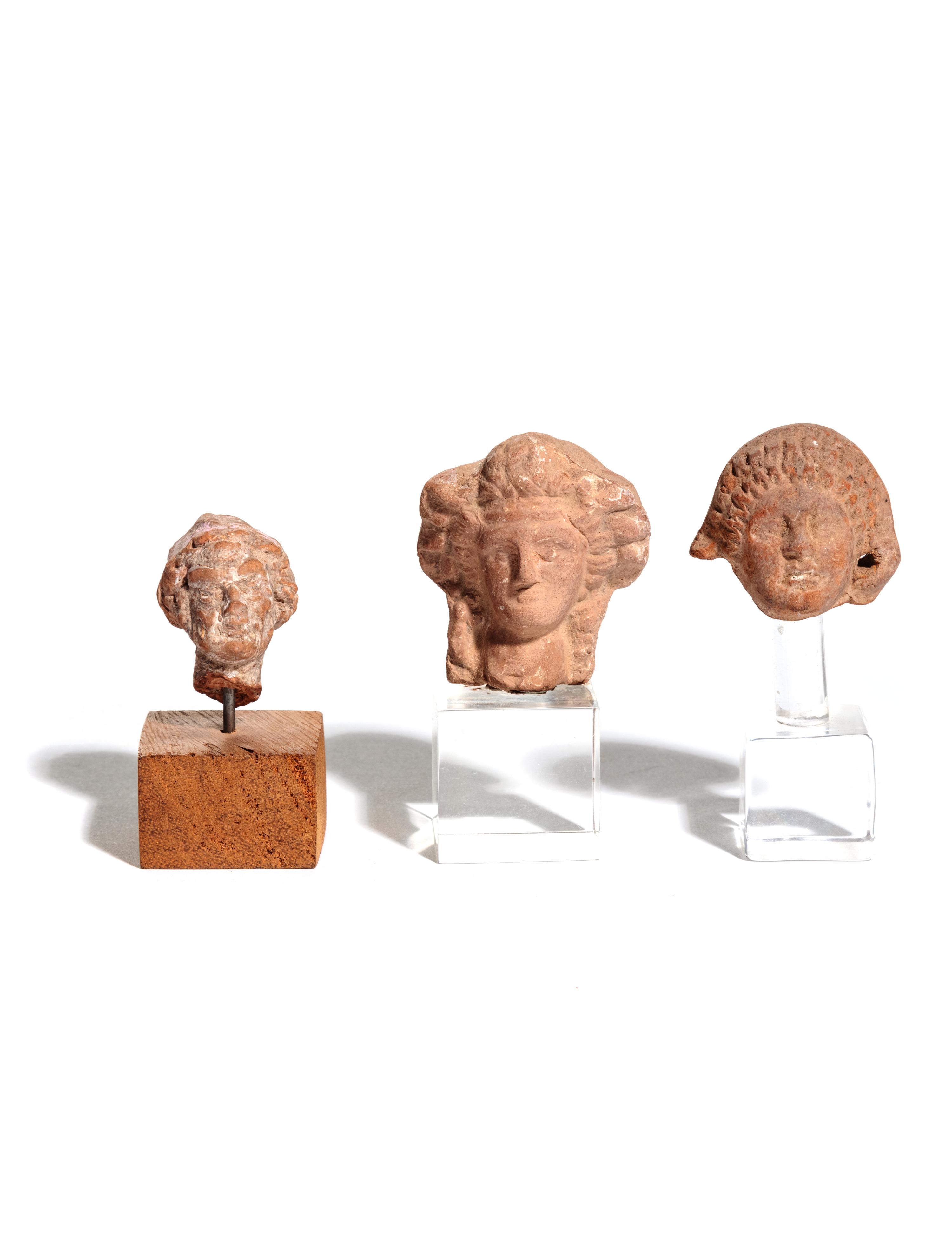Three Graeco-Roman Terra Cotta Heads