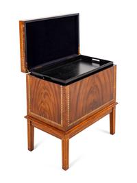 A Georgian Style Mahogany Lift-Top Cabinet Fitted with a Tray Table