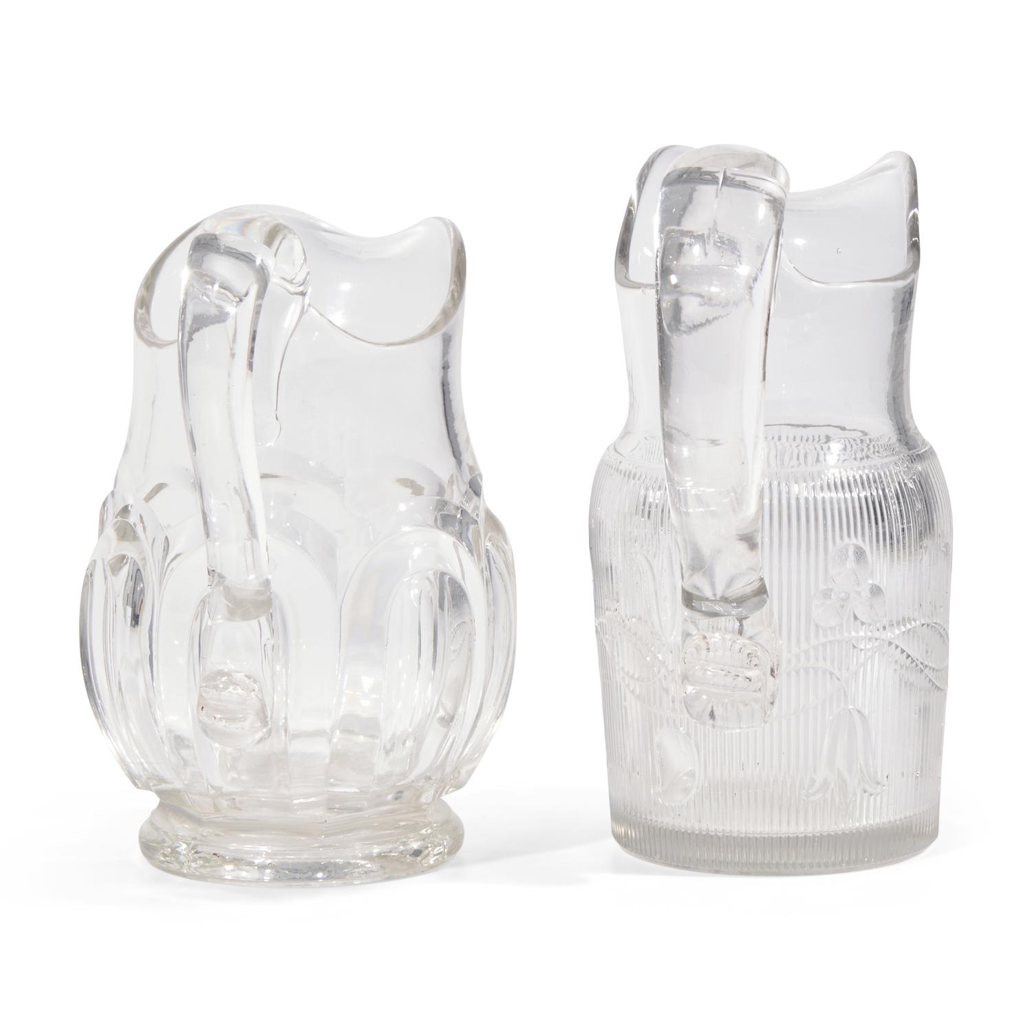 Two Pressed and Molded Flint Glass Pitchers