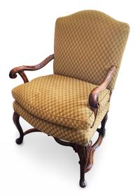 A Continental Carved Walnut Open Armchair Height 41 inches. — 19TH CENTURY