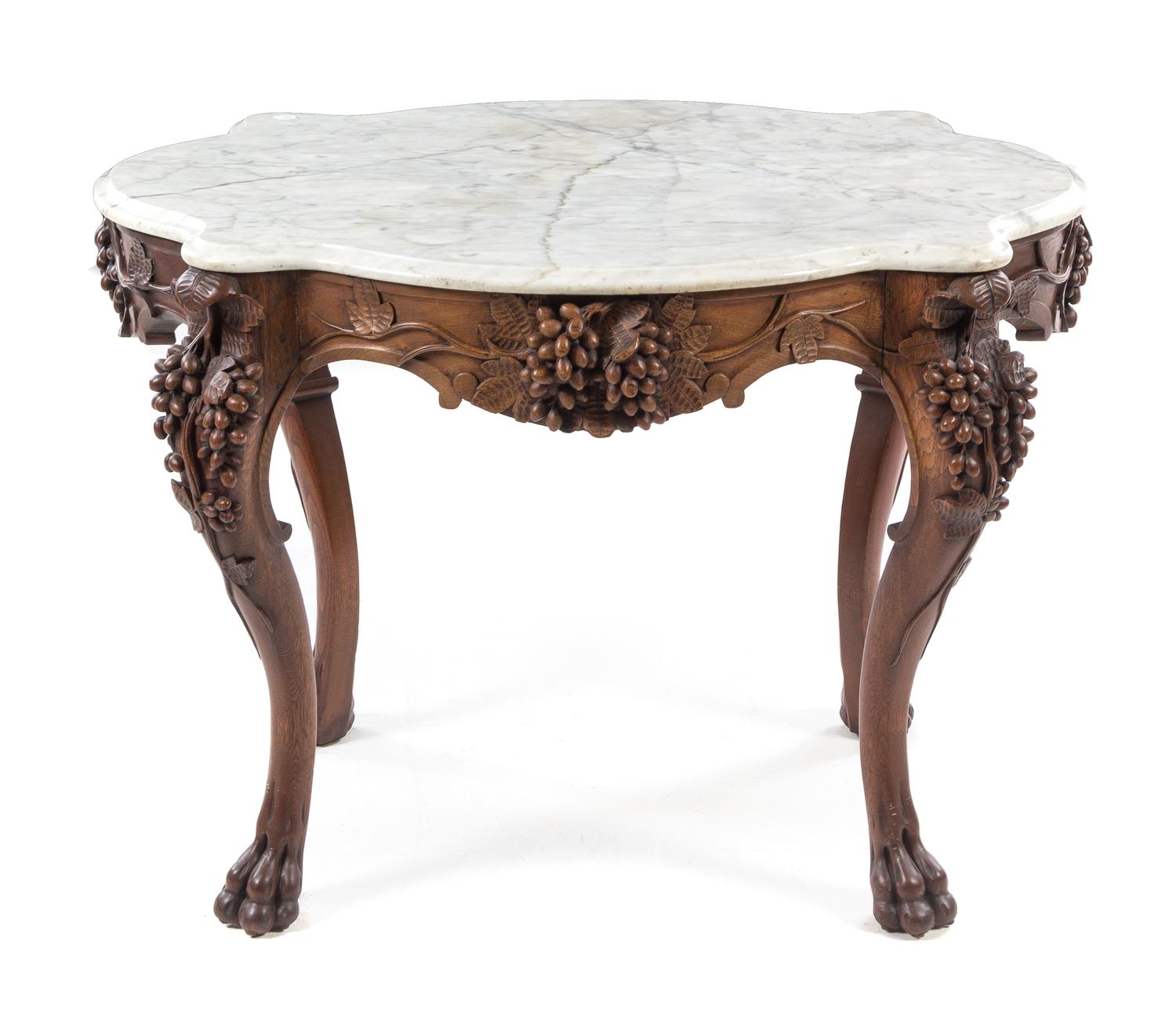A Victorian Style Walnut Parlor Table Height 28 3/4 x width 39 1/2 x depth 30 inches. — 19TH/20TH CENTURY