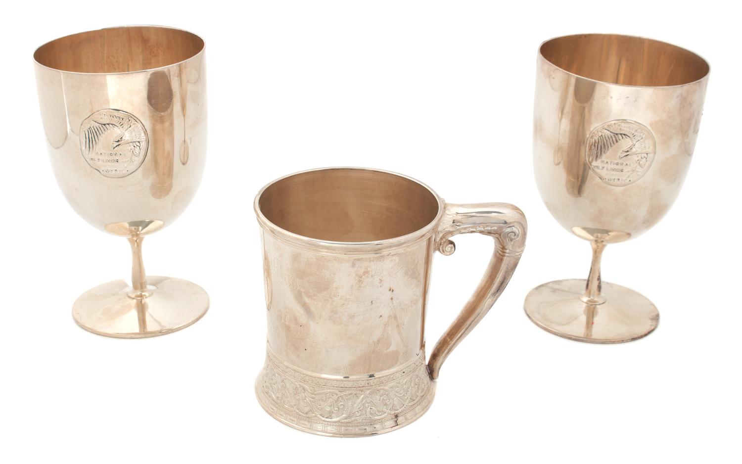 Three American Silver Articles, , comprising: a mug with raised band marked Gorham #36860 2 Tiffany Co. stemmed cups with medallion rea