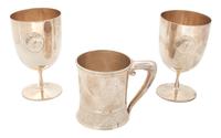 Three American Silver Articles, , comprising: a mug with raised band marked Gorham #36860 2 Tiffany Co. stemmed cups with medallion rea