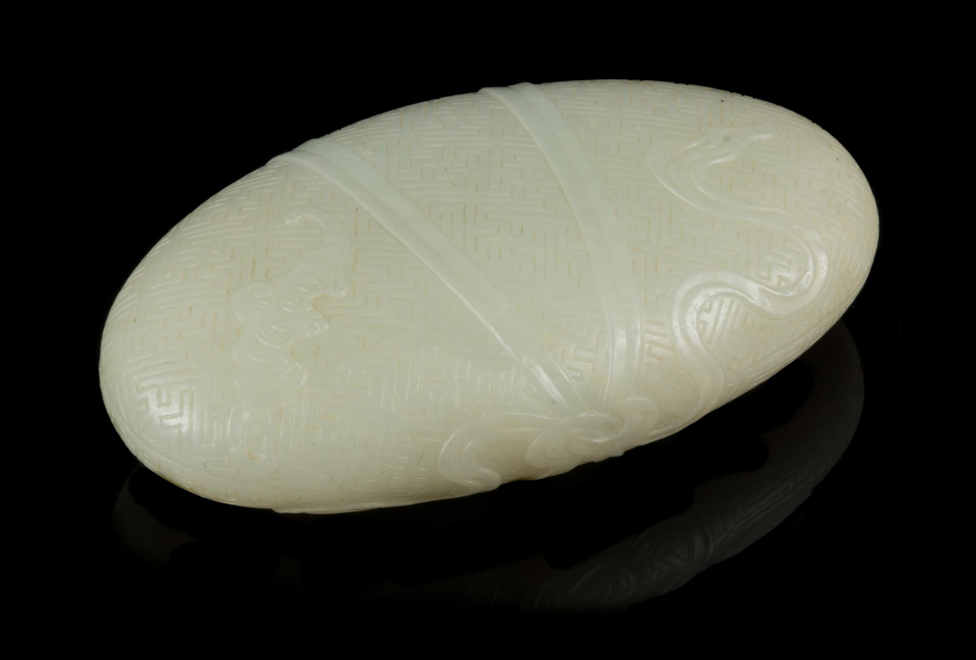 A Pale Celadon Jade Pebble Length 3 3/4 inches. — 18TH/19TH CENTURY