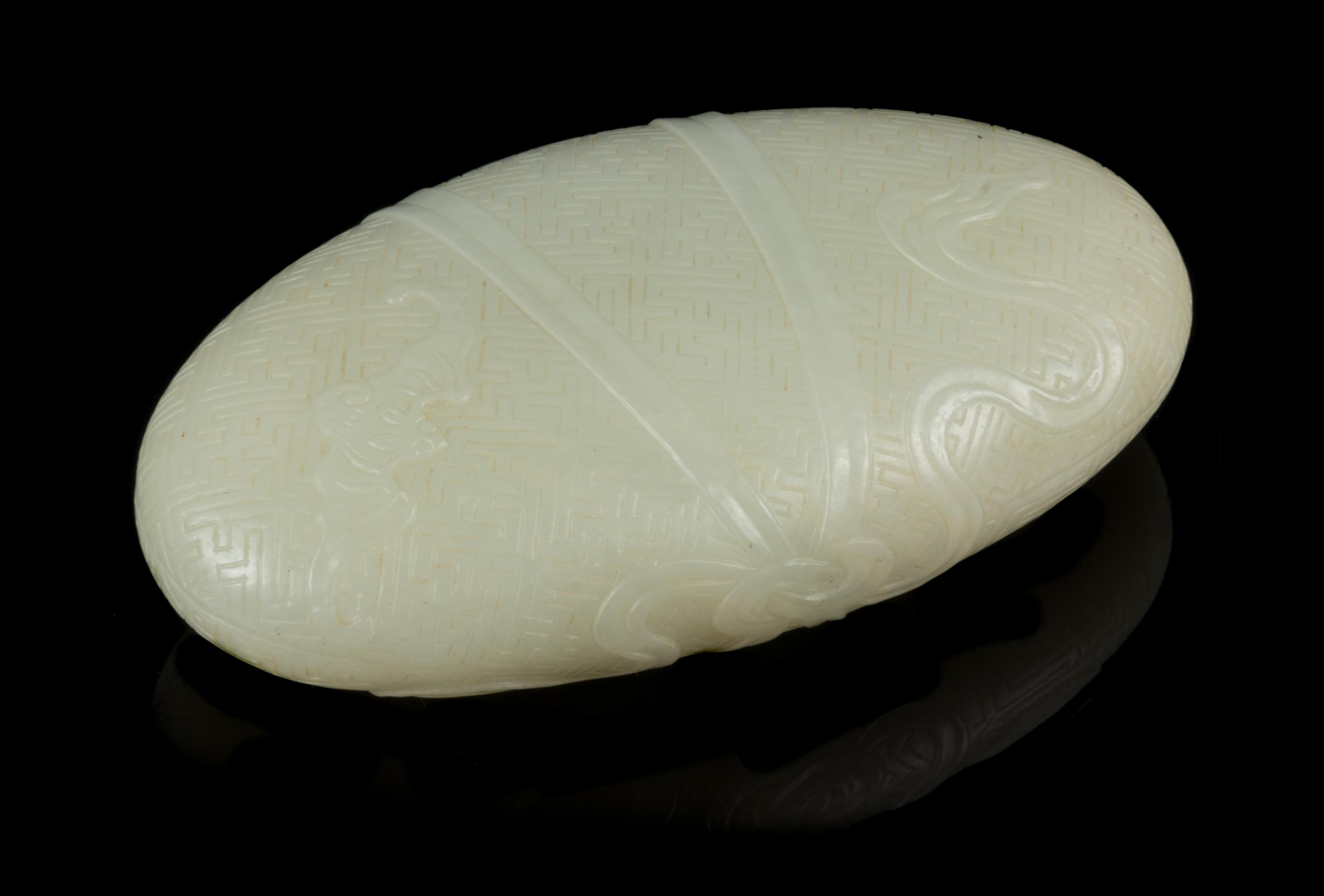 A Pale Celadon Jade Pebble Length 3 3/4 inches. — 18TH/19TH CENTURY