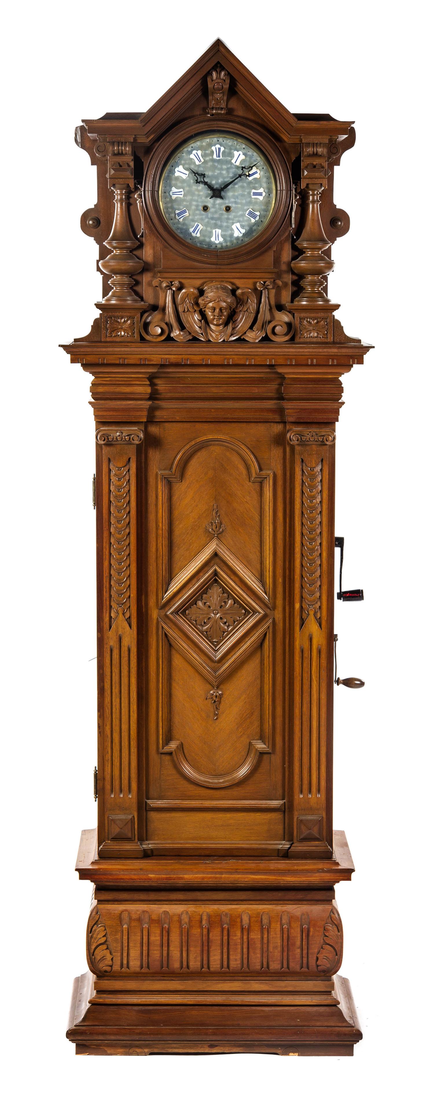 A German Walnut Musical Triple Disc Eroica Tall Case Clock, Height 85 1/2 inches.