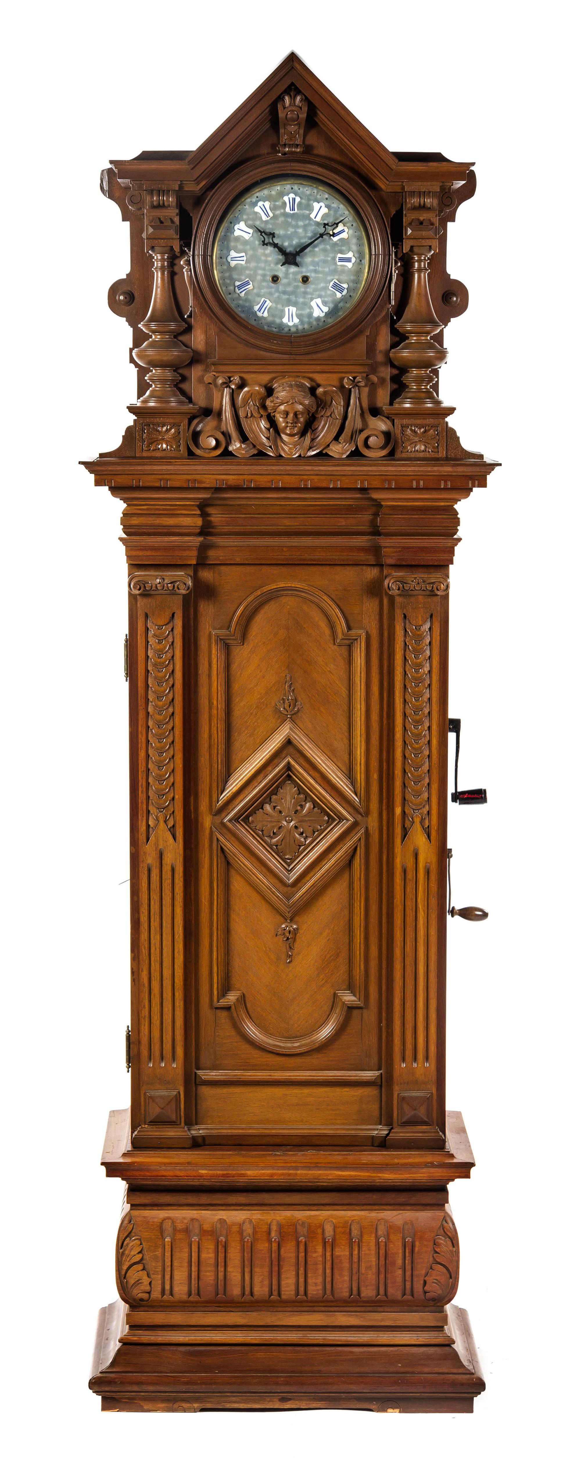 A German Walnut Musical Triple Disc Eroica Tall Case Clock, Height 85 1/2 inches.
