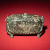 A Chinese Bronze 'Figural' Oil Lamp, Western Han Dynasty — 西漢 青銅神人油燈