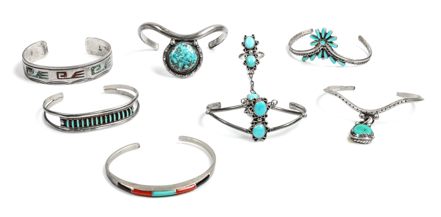 Seven Southwestern Bracelets Length of one 5 3/8 x opening 1 x width 1/2 inches