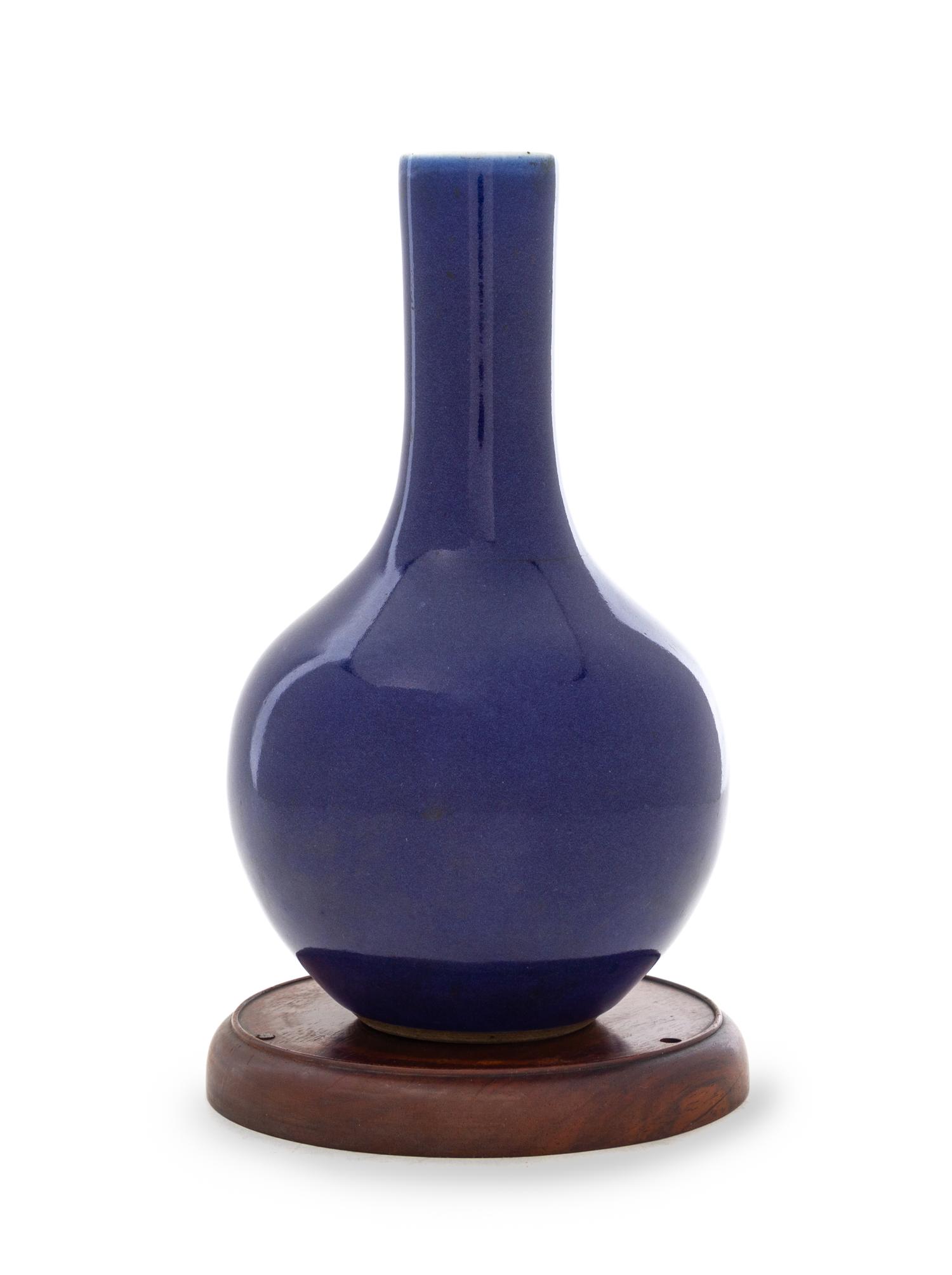 A Chinese Blue Glazed Porcelain Bottle Vase Height 8 1/4 inches. — 18TH CENTURY
