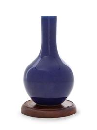 A Chinese Blue Glazed Porcelain Bottle Vase Height 8 1/4 inches. — 18TH CENTURY