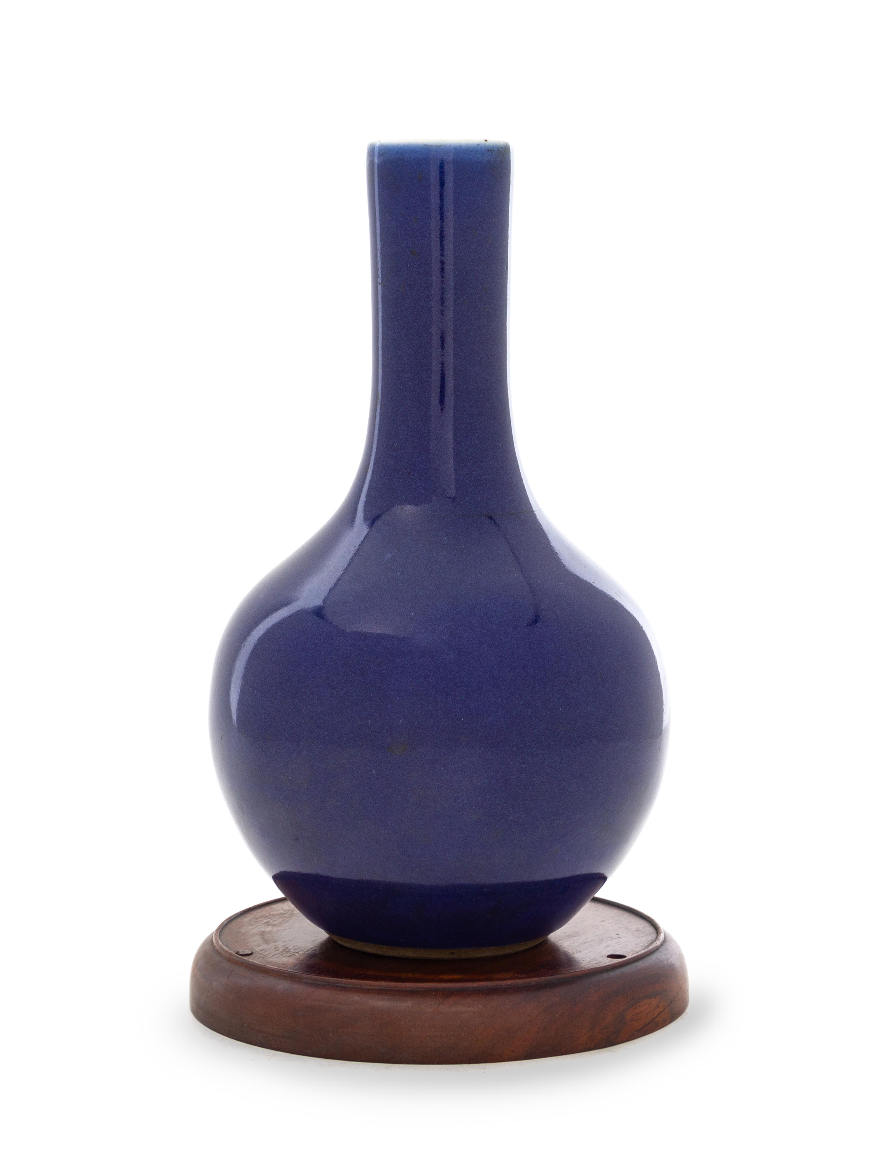 A Chinese Blue Glazed Porcelain Bottle Vase Height 8 1/4 inches. — 18TH CENTURY