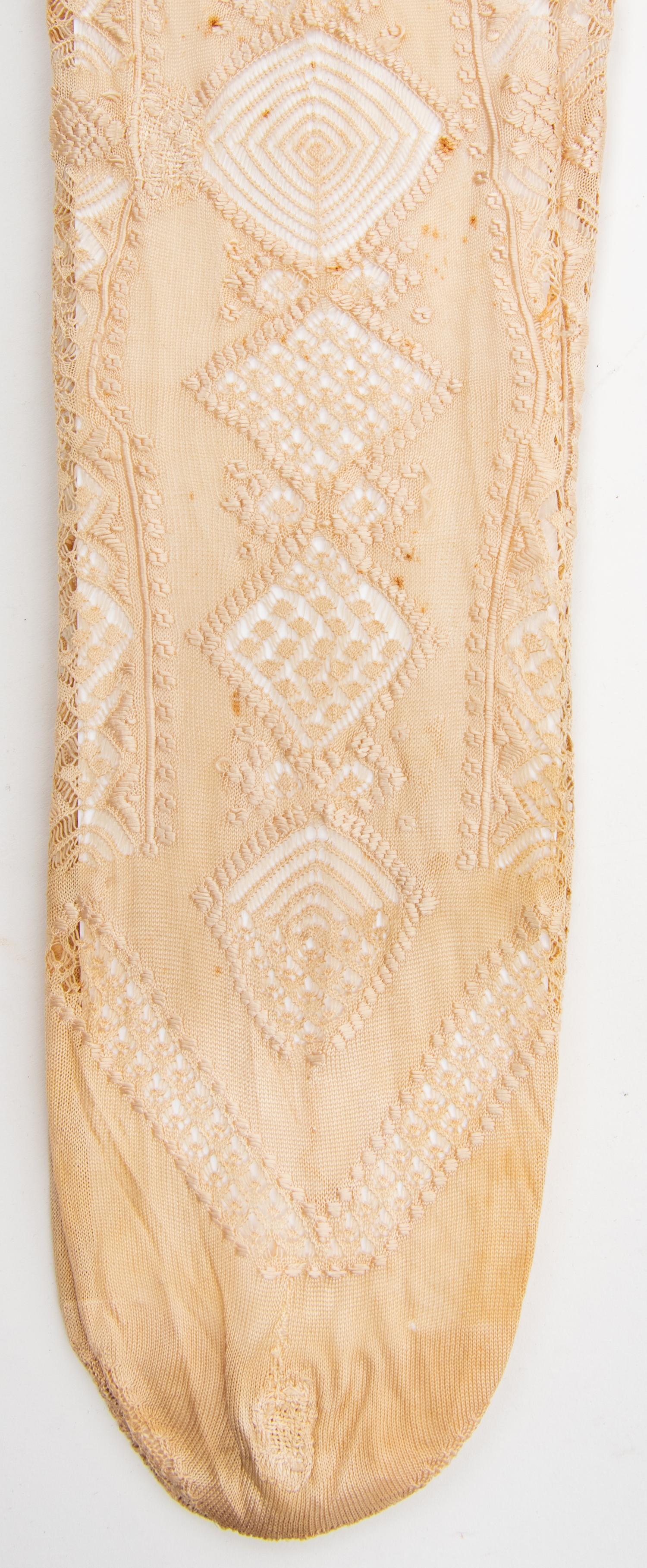Collection of Twenty One Silk and Cotton Stockings, 19th and Early 20th Century
