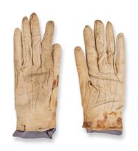 [LINCOLN ASSASSINATION]. A pair of stained leather gloves carried by President Abraham Lincoln at Ford's Theatre on the night of his assassination, 14 April 1865.