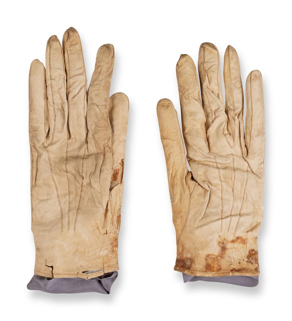 [LINCOLN ASSASSINATION]. A pair of stained leather gloves carried by President Abraham Lincoln at Ford's Theatre on the night of his assassination, 14 April 1865. 
