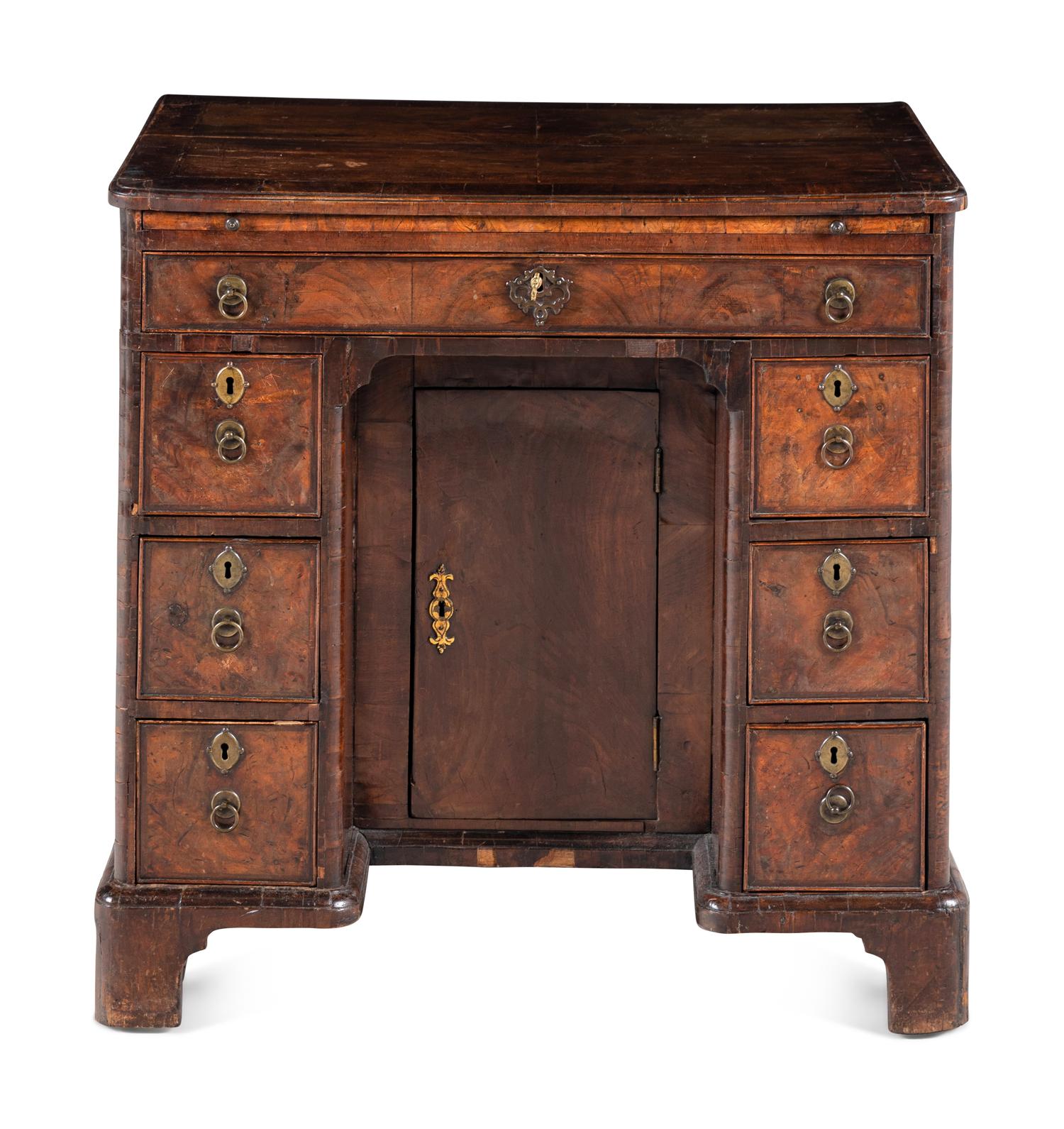A George II Walnut Kneehole Desk