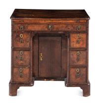 A George II Walnut Kneehole Desk