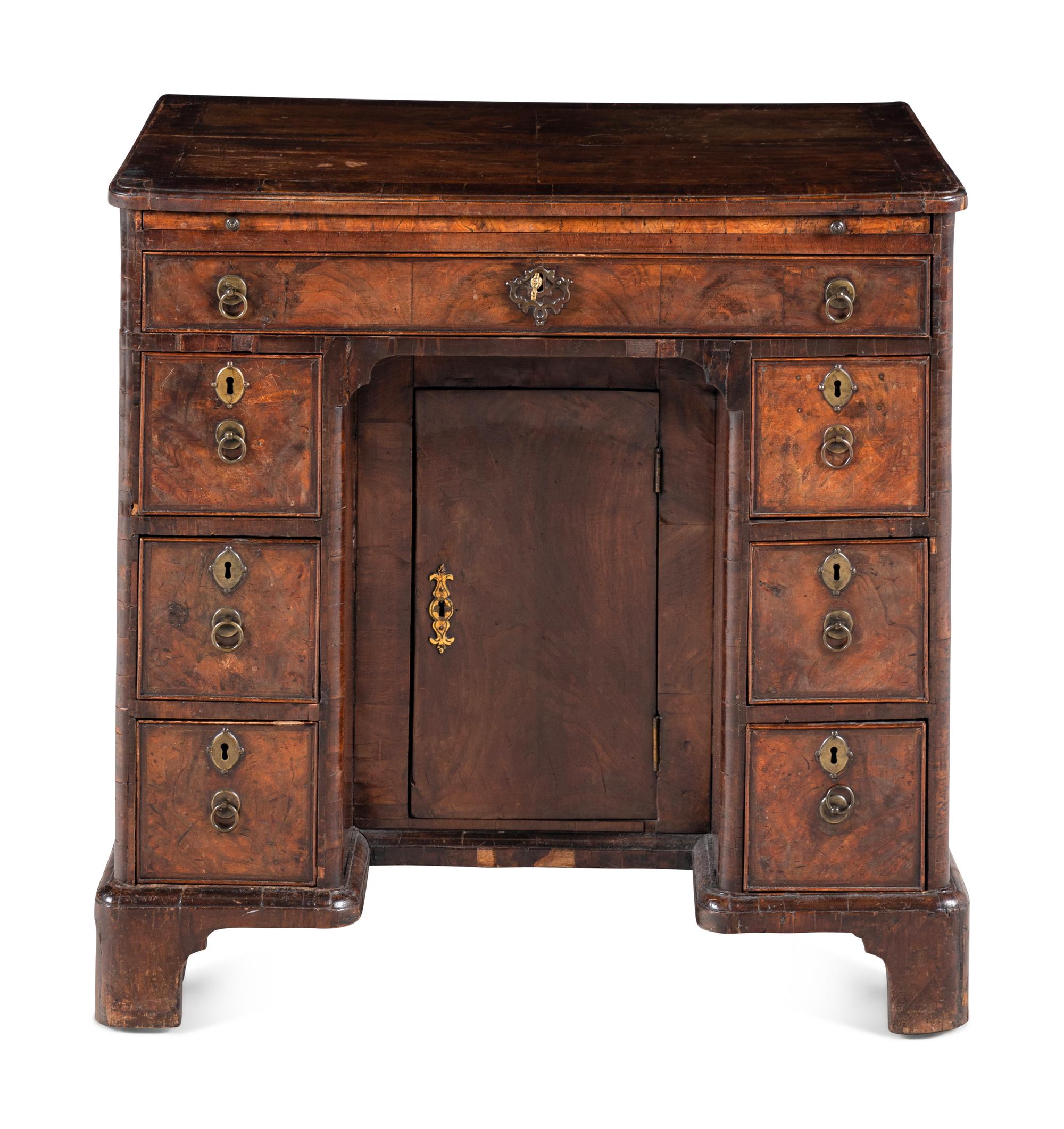 A George II Walnut Kneehole Desk